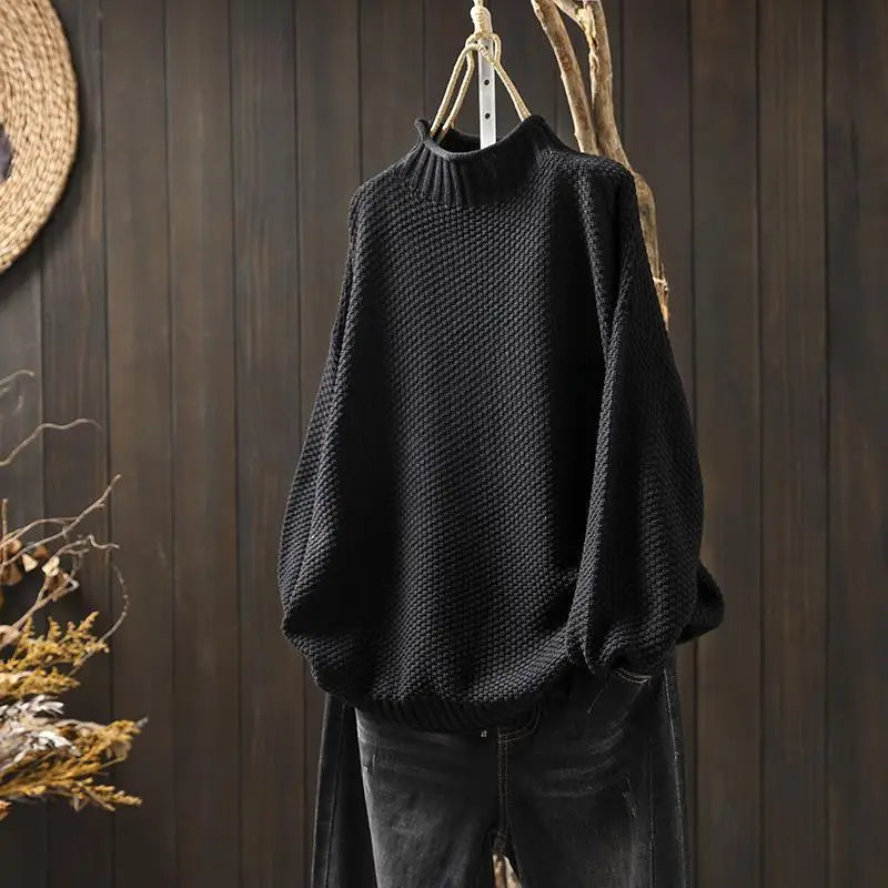 Czarny sweter damski oversize z półgolfem