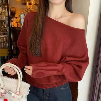 Sweter z odkrytymi ramionami i rękawami nietoperz